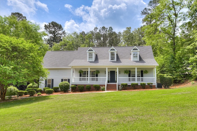 1125 Legacy Ln, Aiken, SC 29803 - new england style home featuring covered porch, a front lawn, crawl space, and view of scattered trees