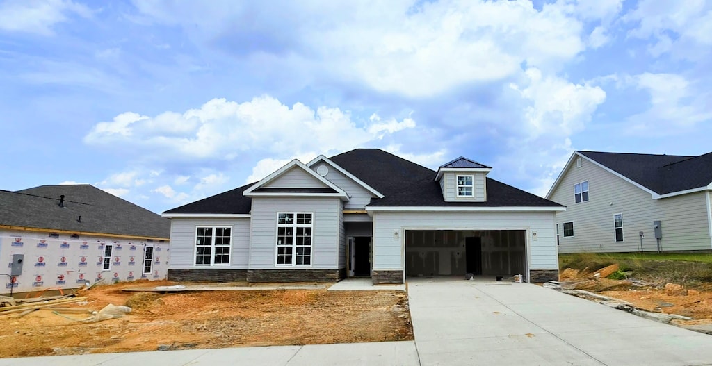 236 Dublin Loop, Grovetown, GA 30813 - view of front of home with stone siding, driveway, and an attached garage