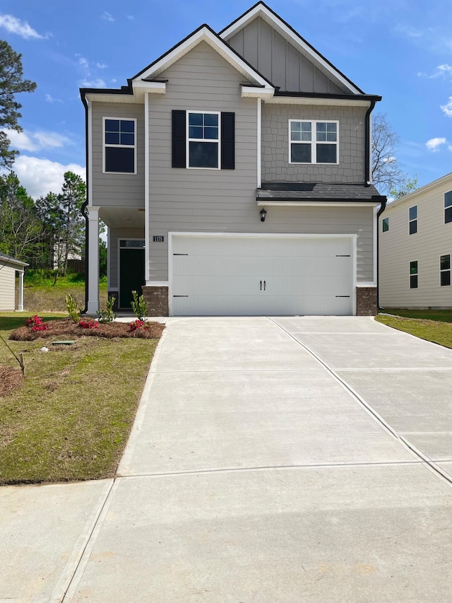 934 Raghorn Rd, Grovetown, GA 30813 - craftsman inspired home featuring a garage, board and batten siding, concrete driveway, and a front yard