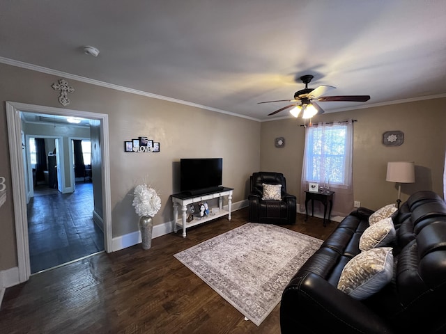 living area with crown molding and dark wood-style flooring