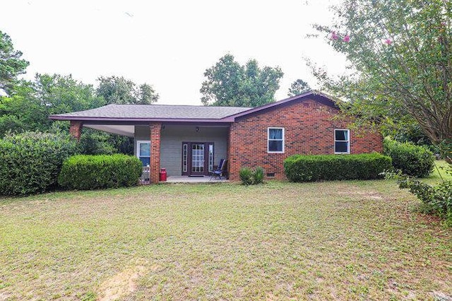 ranch-style home with a front yard