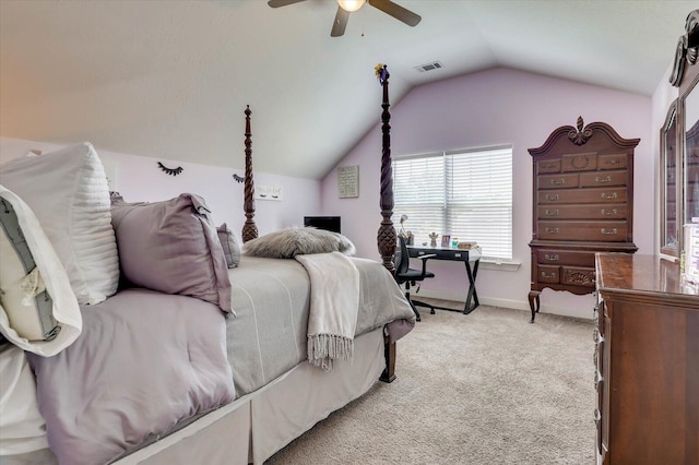 bedroom featuring ceiling fan, lofted ceiling, and light carpet