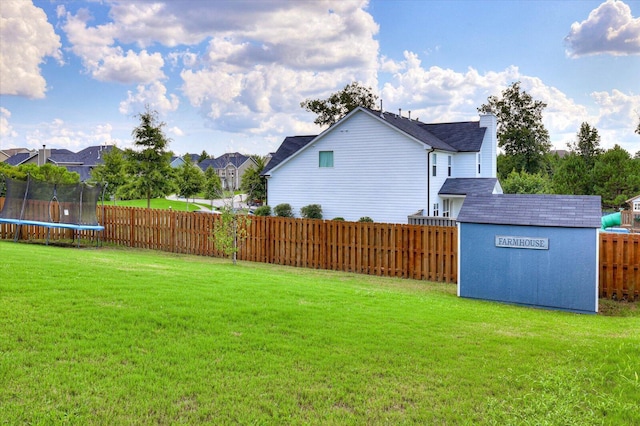 view of yard with a trampoline