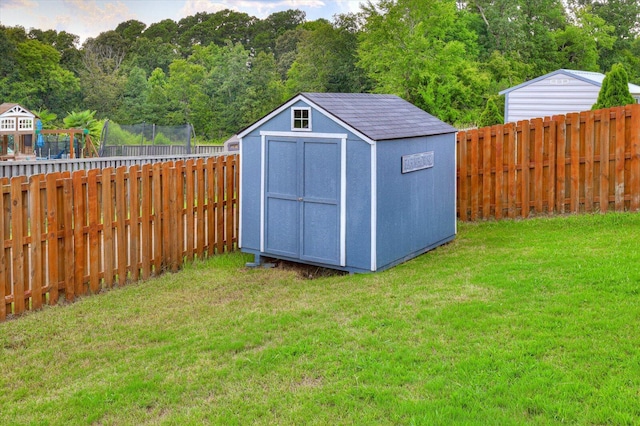 view of outdoor structure with a yard