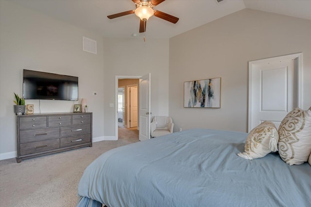 carpeted bedroom with ceiling fan and lofted ceiling