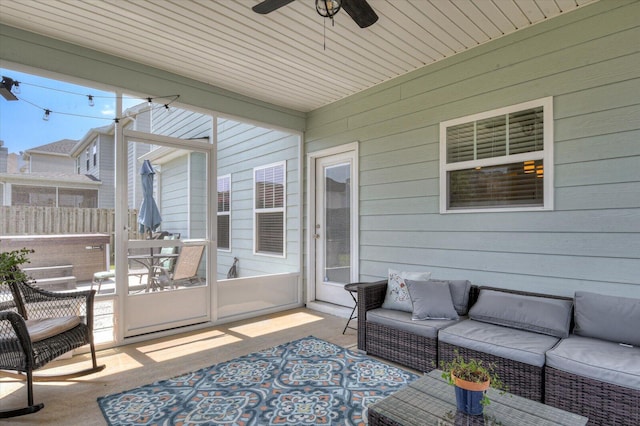 sunroom / solarium with ceiling fan