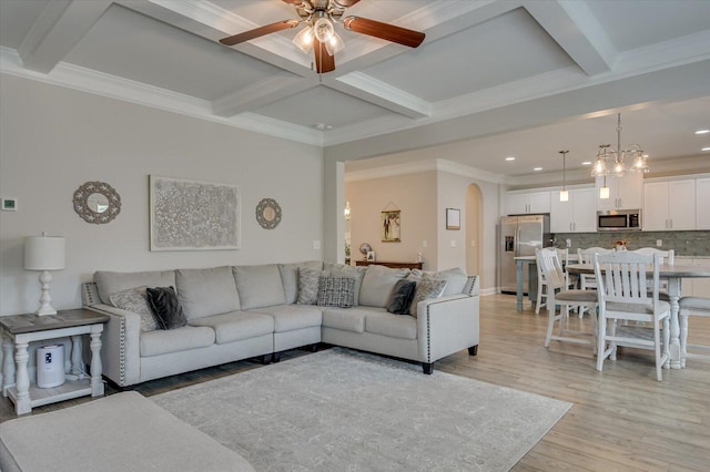 living room with beam ceiling, light wood-type flooring, crown molding, and coffered ceiling