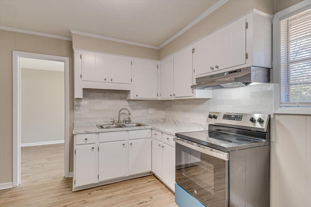 kitchen with stainless steel electric stove, sink, and white cabinets