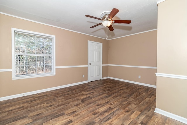 unfurnished room featuring ornamental molding, ceiling fan, and dark hardwood / wood-style flooring