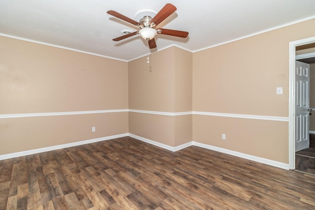 empty room featuring crown molding, ceiling fan, and dark hardwood / wood-style flooring