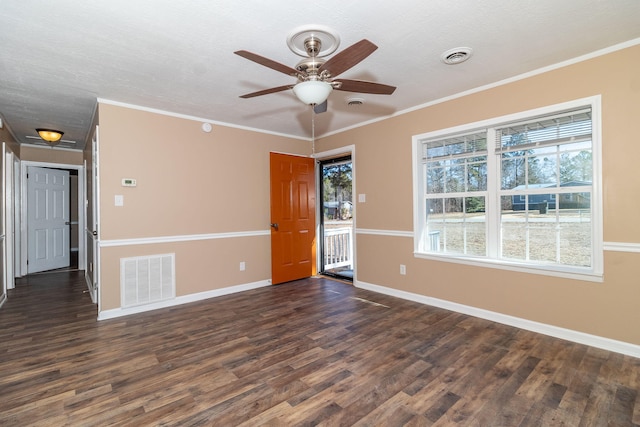 unfurnished room featuring dark hardwood / wood-style flooring, crown molding, and ceiling fan