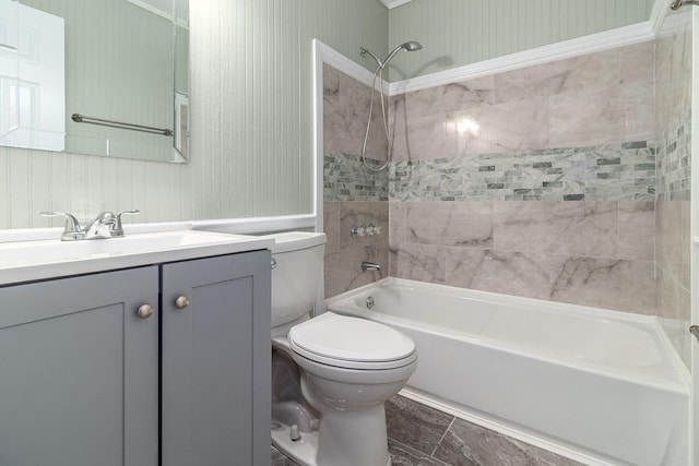 full bathroom featuring vanity, toilet, and tiled shower / bath