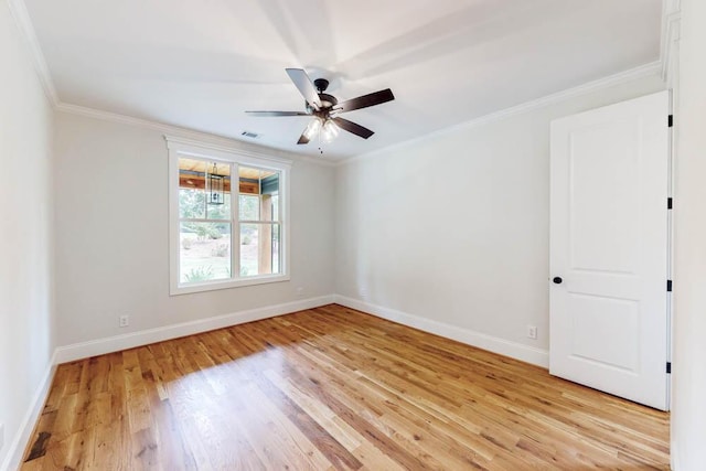 unfurnished room featuring visible vents, crown molding, light wood-style flooring, and baseboards