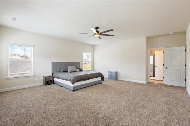 bedroom featuring carpet, visible vents, and baseboards