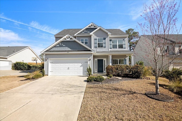 view of front of property with driveway and a porch