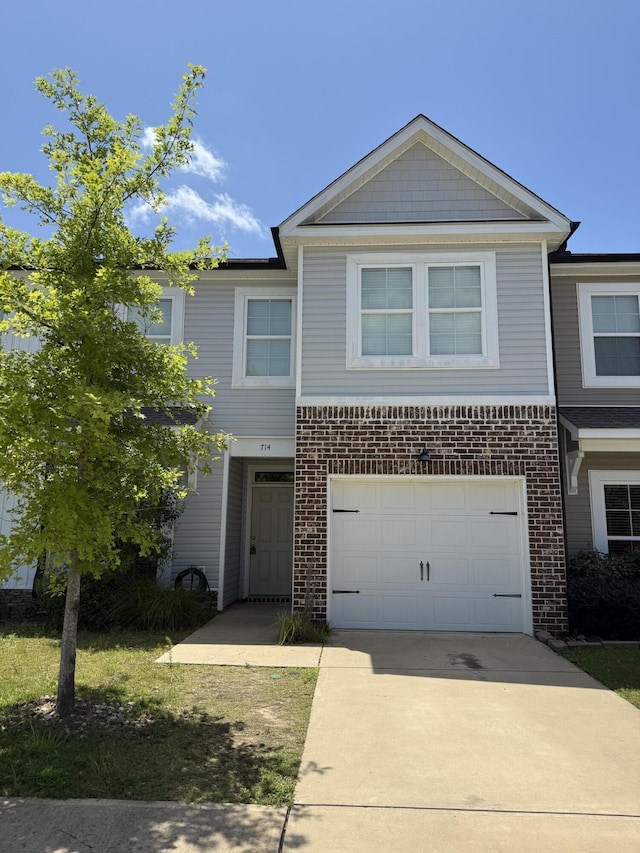 714 Buddy Ct, Grovetown, GA 30813 - view of front of home featuring brick siding, driveway, and an attached garage