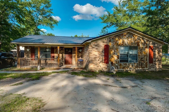 2237 Winston Way, Augusta, GA 30906 - ranch-style home featuring covered porch, a metal roof, and stone siding