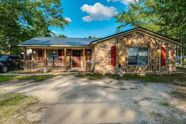 2237 Winston Way, Augusta, GA 30906 - single story home with covered porch, a metal roof, and stone siding