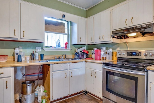 2237 Winston Way, Augusta, GA 30906 - kitchen featuring stainless steel electric range oven, under cabinet range hood, white cabinetry, light countertops, and ornamental molding