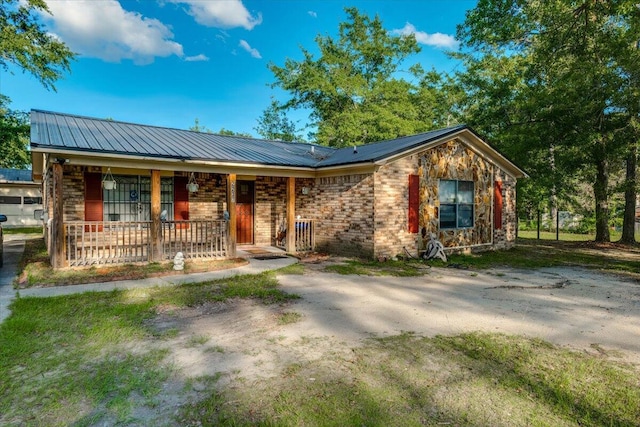 2237 Winston Way, Augusta, GA 30906 - single story home with a porch, a metal roof, and brick siding