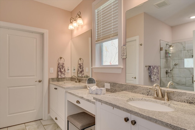 2020 Sinclair Dr, Grovetown, GA 30813 - bathroom featuring vanity and tiled shower