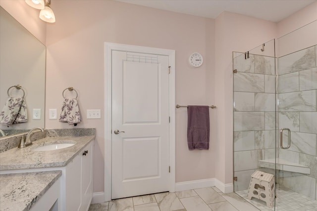 2020 Sinclair Dr, Grovetown, GA 30813 - full bath featuring a shower stall, marble look tiles, baseboards, and vanity
