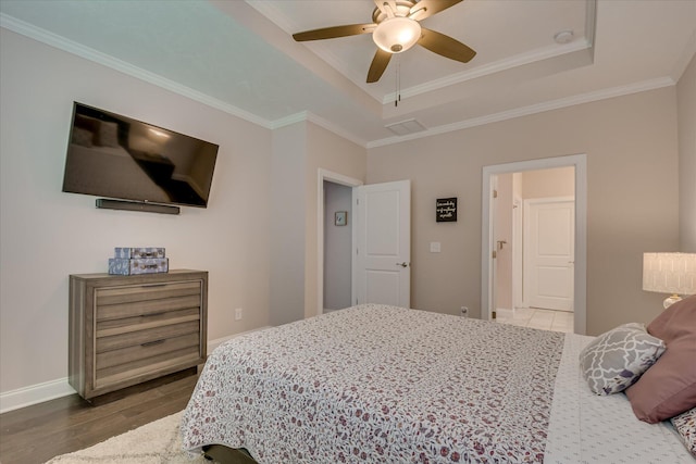 2020 Sinclair Dr, Grovetown, GA 30813 - bedroom with a raised ceiling, wood finished floors, baseboards, ornamental molding, and a ceiling fan