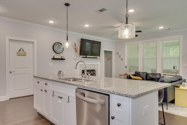 2020 Sinclair Dr, Grovetown, GA 30813 - kitchen with dishwasher, a sink, crown molding, wood finished floors, and an island with sink