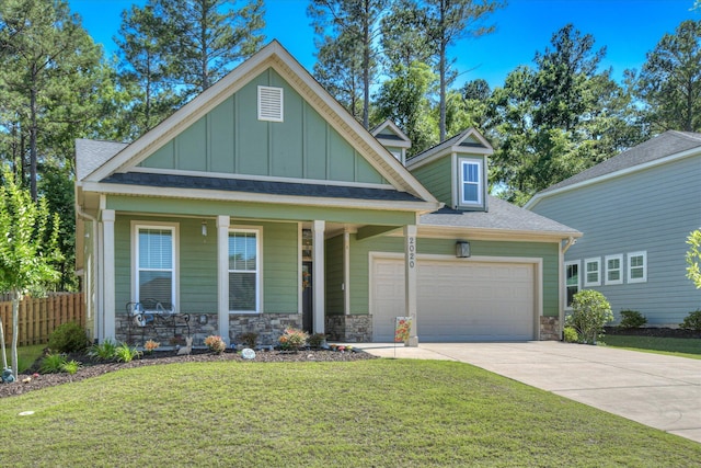 2020 Sinclair Dr, Grovetown, GA 30813 - craftsman inspired home with stone siding, board and batten siding, concrete driveway, a garage, and a porch