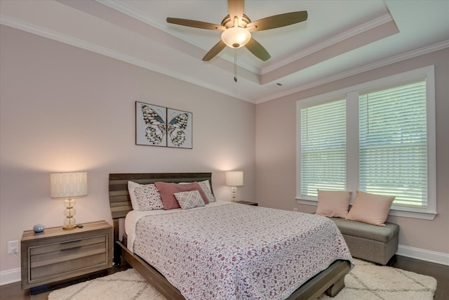 2020 Sinclair Dr, Grovetown, GA 30813 - bedroom featuring wood finished floors, a raised ceiling, baseboards, crown molding, and a ceiling fan