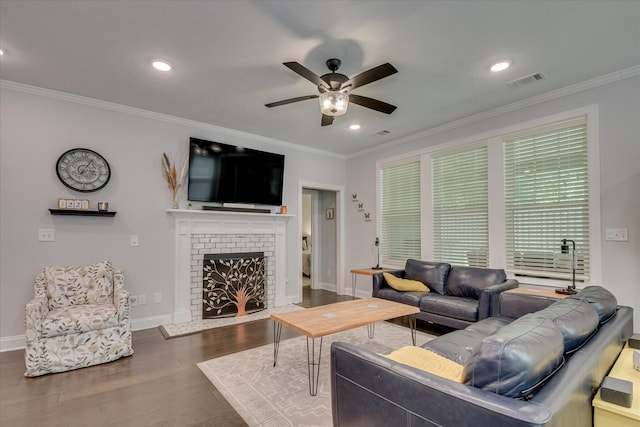 2020 Sinclair Dr, Grovetown, GA 30813 - living room featuring a ceiling fan, wood finished floors, crown molding, a brick fireplace, and baseboards
