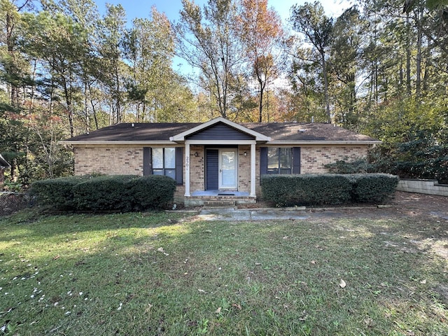 ranch-style house with a front lawn