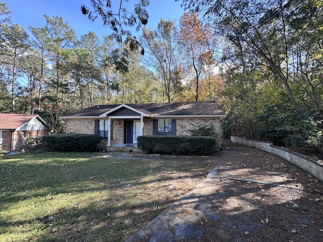 ranch-style house with a front yard