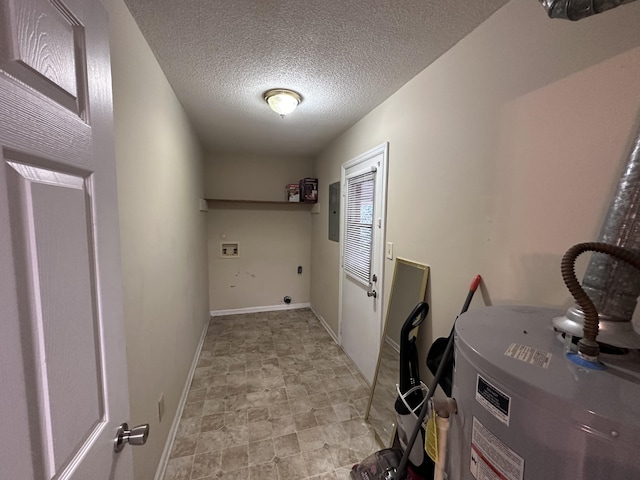 laundry area featuring hookup for an electric dryer, a textured ceiling, and hookup for a washing machine