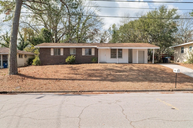 single story home featuring covered porch