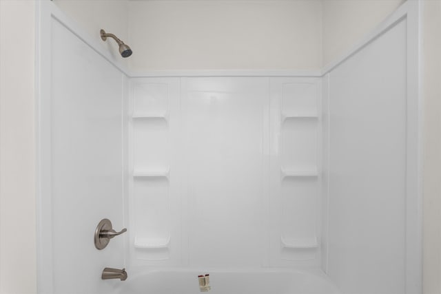 bathroom with shower / bathtub combination