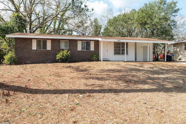 single story home with a carport