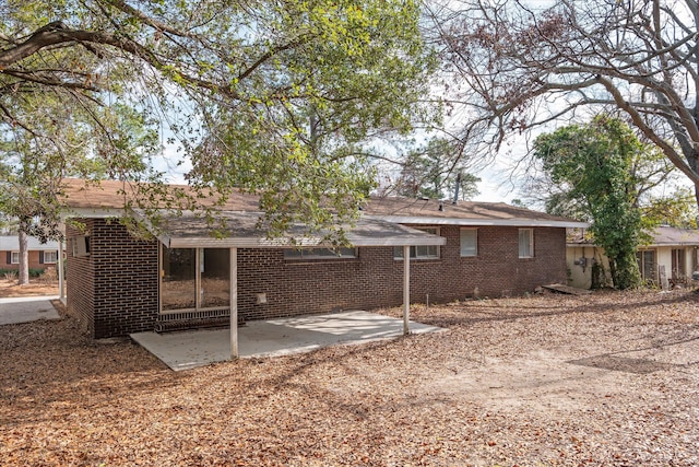 rear view of property with a patio area