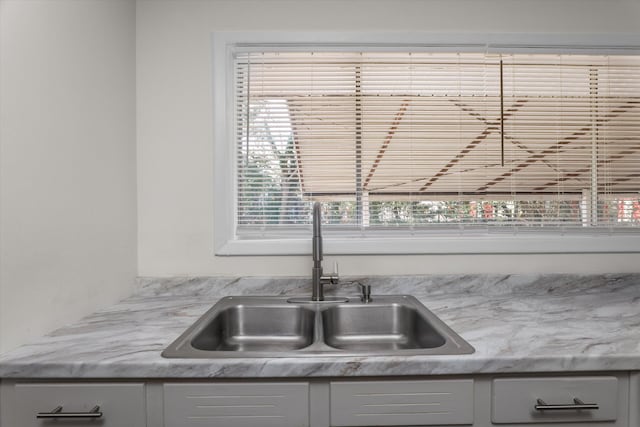 room details with sink and light stone counters