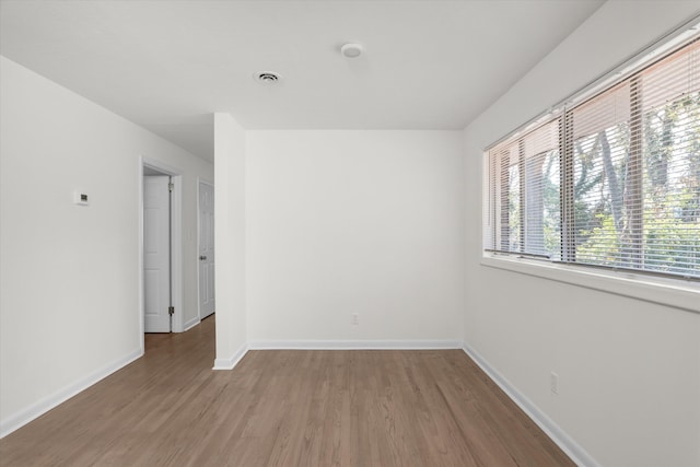 1439 Ridgewood Dr, Augusta, GA 30909 - unfurnished living room with dark wood-type flooring, lofted ceiling, baseboards, and a sink