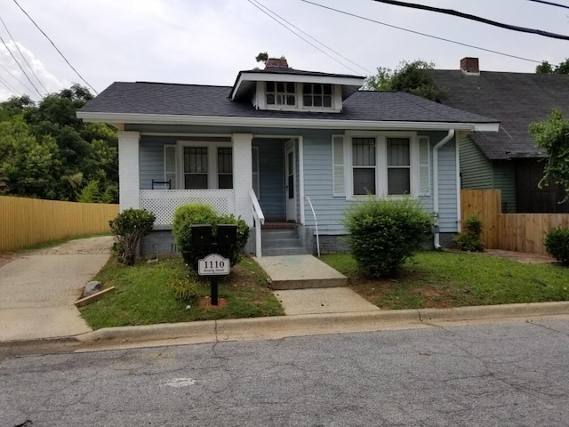 bungalow featuring covered porch