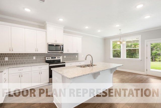 kitchen featuring pendant lighting, a center island with sink, sink, white cabinetry, and stainless steel appliances