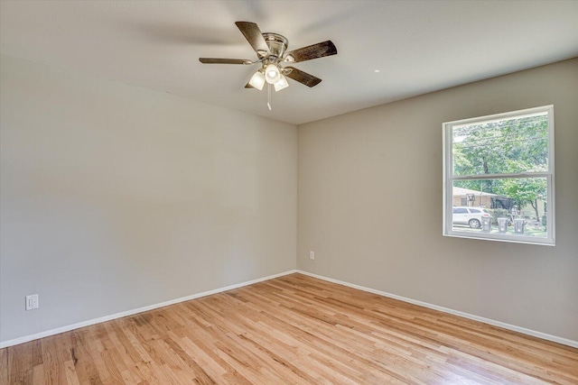 empty room featuring light hardwood / wood-style floors and ceiling fan