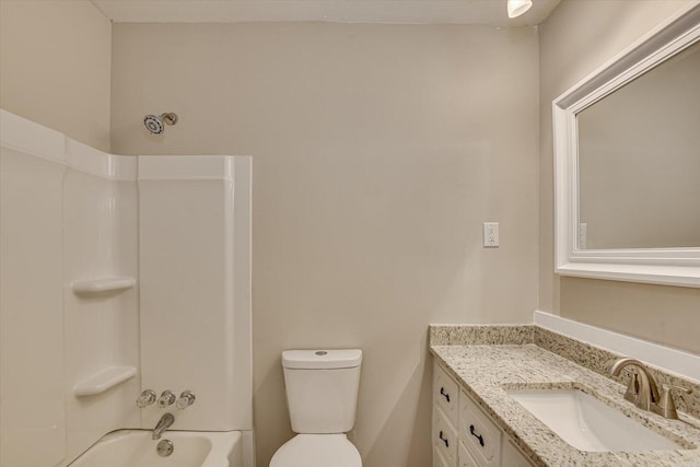 full bathroom with shower / washtub combination, vanity, and toilet