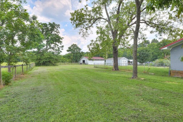 889 Woodhaven St, North, SC 29112 - fenced backyard featuring view of scattered trees