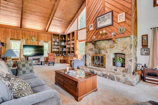 889 Woodhaven St, North, SC 29112 - carpeted living area with high vaulted ceiling, wooden walls, a wooden ceiling with exposed beams, plenty of natural light, and a stone fireplace