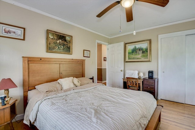 889 Woodhaven St, North, SC 29112 - bedroom with light wood-type flooring, crown molding, a closet, and ceiling fan