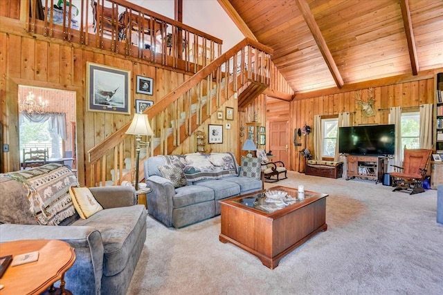 889 Woodhaven St, North, SC 29112 - living area featuring wood walls, stairs, plenty of natural light, carpet, and a chandelier