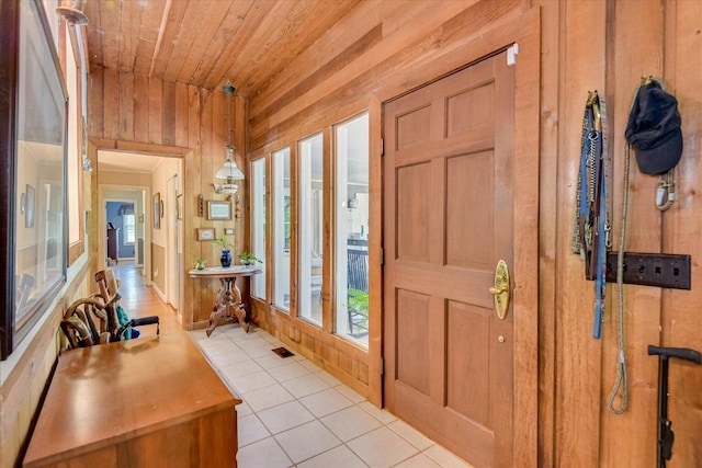 889 Woodhaven St, North, SC 29112 - foyer entrance featuring wooden ceiling, light tile patterned floors, and wooden walls
