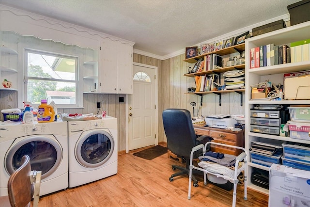 889 Woodhaven St, North, SC 29112 - washroom featuring washing machine and clothes dryer, crown molding, light wood-type flooring, a textured ceiling, and wooden walls